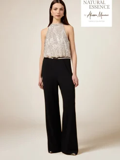 Tuta bimaterica con top in paillettes