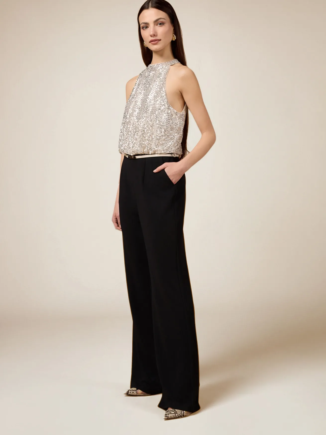 Tuta bimaterica con top in paillettes