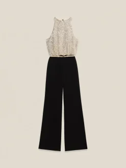 Tuta bimaterica con top in paillettes